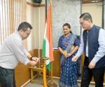 Planning Adviser Som Kamei, Financial Adviser Thanglemlian, and Dr. Suchita, the Statistical Adviser, are lighting the  ceremonial lamp