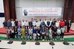 NEC staff posing for a group photograph after the oath-taking ceremony