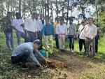 SE M. Kalita planting a tree during the 'Ek Ped Maa Ke Naam' campaign