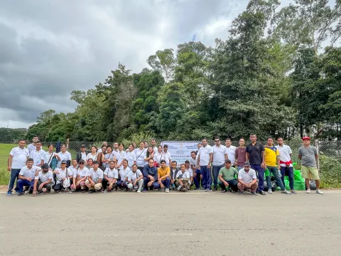 NEC officials posing for a group photograph after the Transf