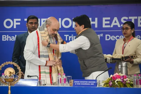 Home Minister and Chairman of the NEC, Mr. Amit Shah, is being felicitated by the Minister of MDoNER and Vice Chairman, Mr. Jyotiraditya M. Scindia