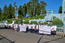 NEC staff posing for a group photograph during the Walkathon