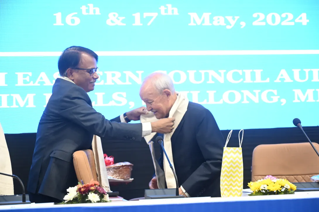 Member, NEC Sh. Tenzing Norbu Thongdok is being welcomed by